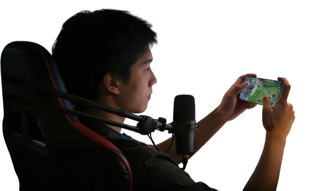 Side profile of a person holding the iQOO 15 Ultra in landscape orientation, demonstrating the phone's use in a gaming and streaming environment.