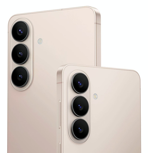 Detailed view of the Samsung Galaxy S26 Plus rear camera system, featuring three vertically aligned lenses with individual metallic rings on a Pink Gold matte finish.