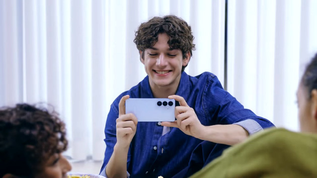 Samsung Galaxy S26 Plus Sky Blue in hand