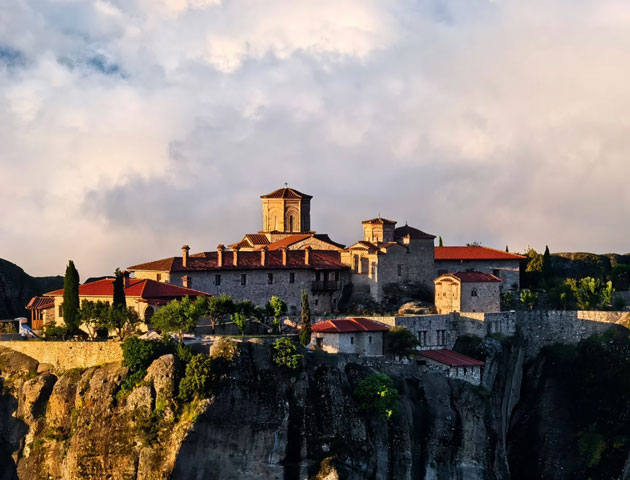 A landscape photograph of a stone monastery built atop a sheer cliff taken with the Huawei Pura 80 Ultra A landscape photograph of a stone monastery built atop a sheer cliff, taken with the Huawei Pura 80 Ultra.