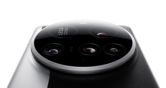 Close up low angle view of the Xiaomi 15 Ultras circular rear camera module with Leica branding and four lens sensors Close-up, low-angle view of the Xiaomi 15 Ultra's circular rear camera module, with Leica branding and four lens sensors.