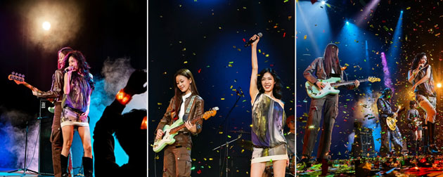 Live concert photography captured with the Huawei Pura 80 Ultra showing a singer and guitarist on stage with vibrant lighting smoke effects and falling confetti Live concert photography captured with the Huawei Pura 80 Ultra, showing a singer and guitarist on stage with vibrant lighting, smoke effects, and falling confetti.