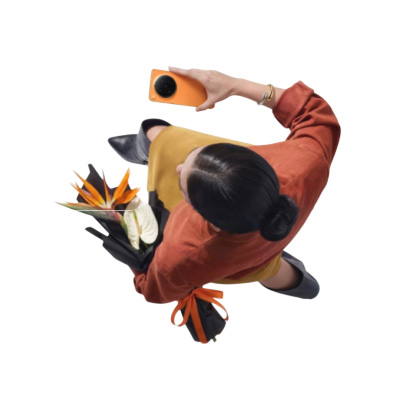 OPPO Find N6 Blossom Orange in woman's hand