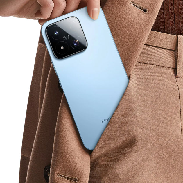 A Xiaomi 17 Max Blue with a Leica camera module tucked inside the pocket of a brown colored coat A Xiaomi 17 Max Blue with a Leica camera module, tucked inside the pocket of a brown-colored coat.