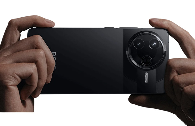 Hands holding the black Poco F7 Pro phone horizontally showing its rear camera module Hands holding the black Poco F7 Pro phone horizontally, showing its rear camera module.