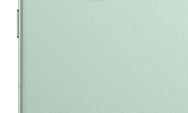 High quality green vegan leather texture on the back panel of the Realme GT 8 Pro.