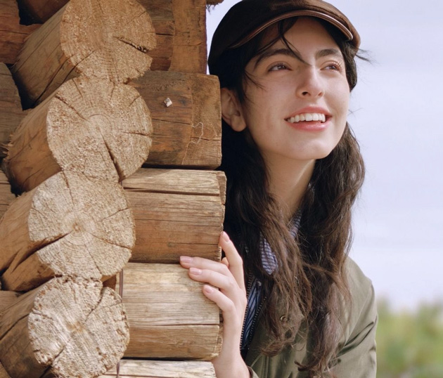 Portrait beside wooden pieces captured with OPPO Find X9 Ultra camera