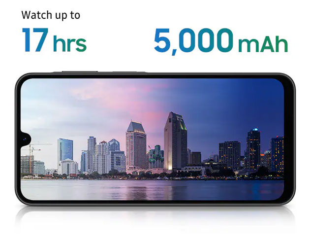 Samsung Galaxy A26 smartphone displaying a cityscape on its screen, highlighting up to 17 hours of video playback and a 5000mAh battery capacity.