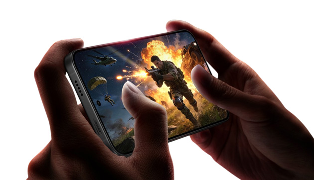 View of an action game running on the Xiaomi Redmi K90 Max in landscape mode while holding the device with both hands.
