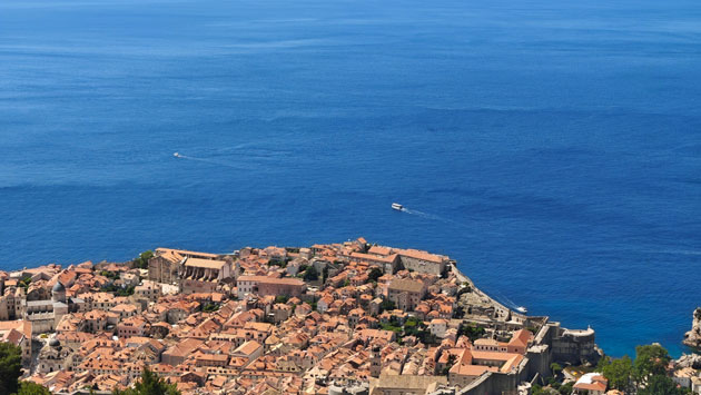 Photo taken with the Nothing Phone 3 camera from an overhead view of the old coastal city of Dubrovnik featuring orange terracotta roofs and the vast blue sea Photo taken with the Nothing Phone (3) camera from an overhead view of the old coastal city of Dubrovnik, featuring orange terracotta roofs and the vast blue sea.