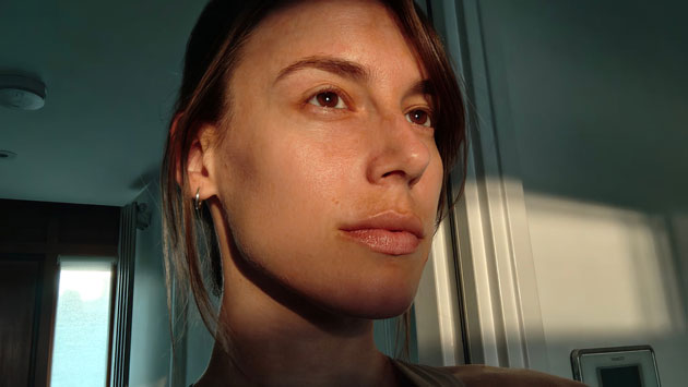Selfie taken with the Nothing Phone 3 camera showing a womans face in warm natural sunlight Selfie taken with the Nothing Phone (3) camera showing a woman's face in warm, natural sunlight.